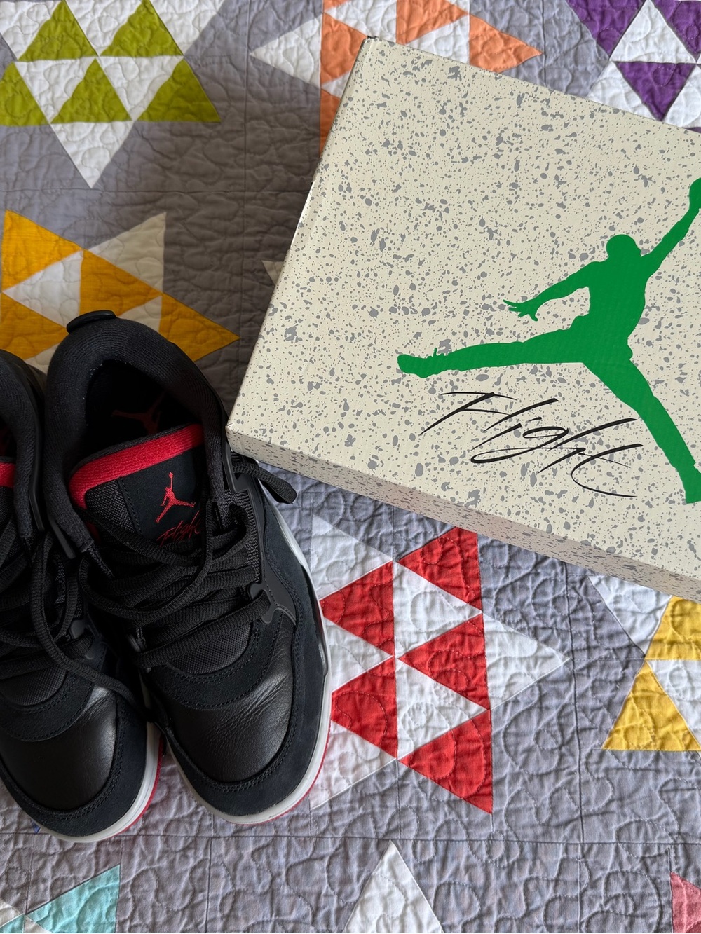 Men’s Air Jordan 4 RM Black and Varsity Red Sneakers